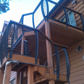 Exterior Staircase with Iron Railings