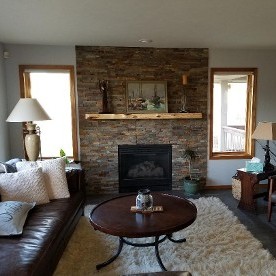 Living Room with Table and Fireplace